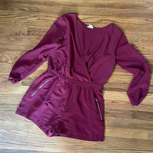 Red romper with zip pockets